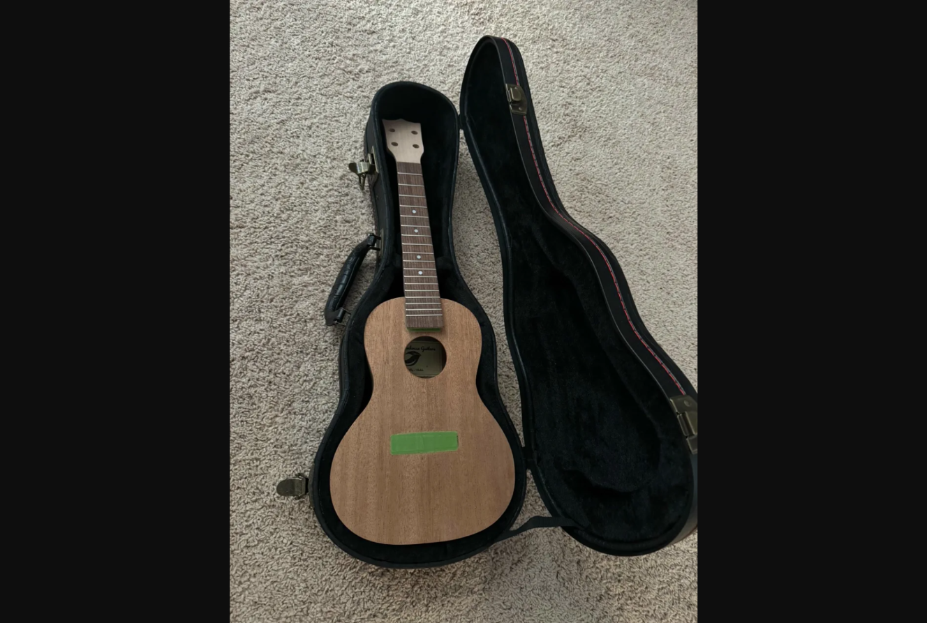 Oakley's ukulele — built from a StewMac kit, with Chickenhouse Guitars label inside